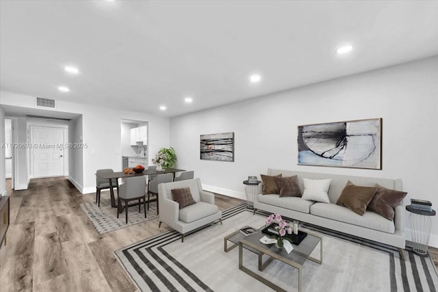 living room featuring light wood-type flooring