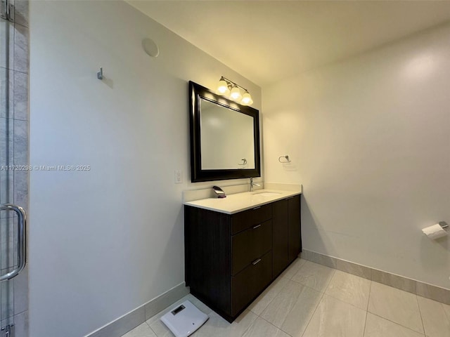 bathroom with tile patterned floors and vanity