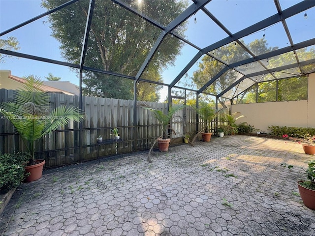 view of patio / terrace with a lanai