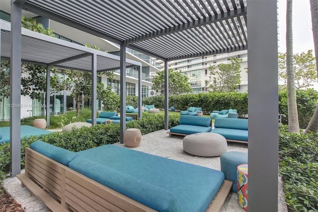 view of patio / terrace featuring a pergola and an outdoor hangout area