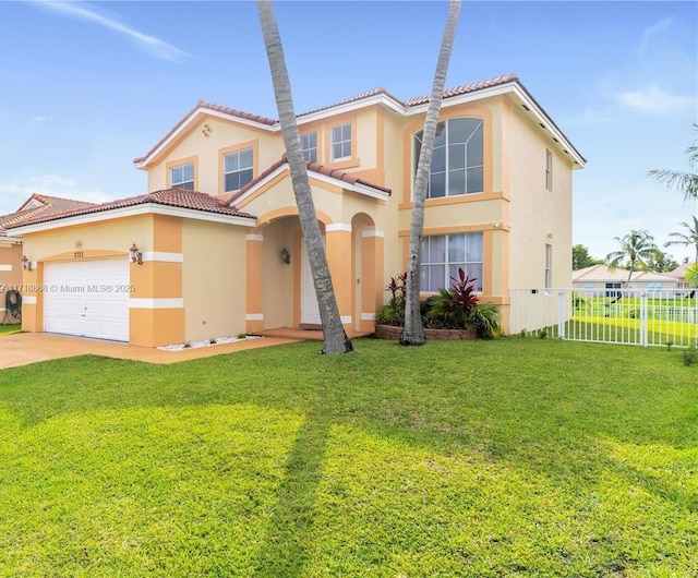 mediterranean / spanish-style house featuring a garage and a front lawn