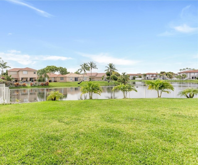 view of yard with a water view