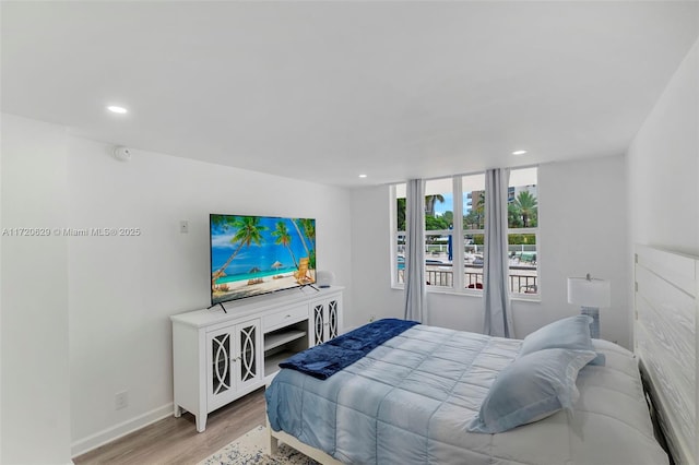 bedroom featuring wood-type flooring