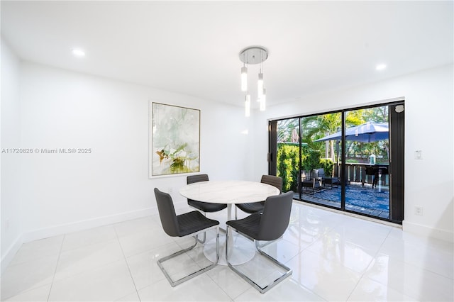 dining area with light tile patterned floors