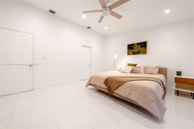 bedroom featuring ceiling fan and light tile patterned flooring