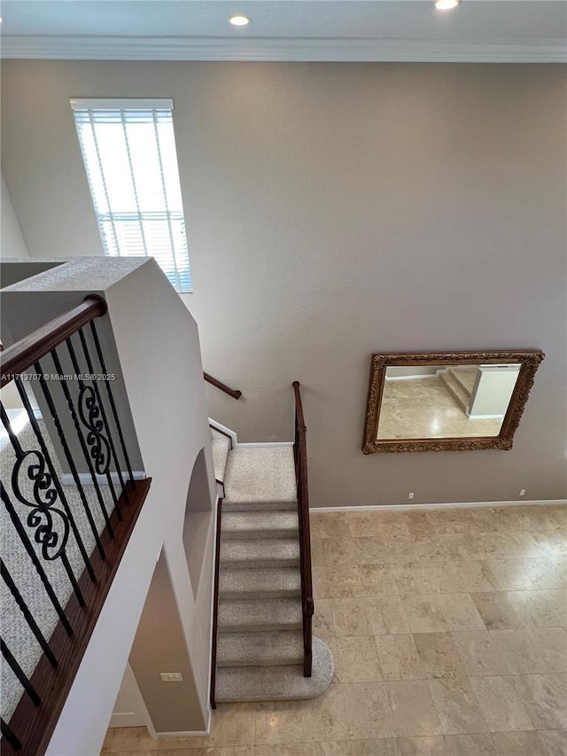 stairs featuring ornamental molding