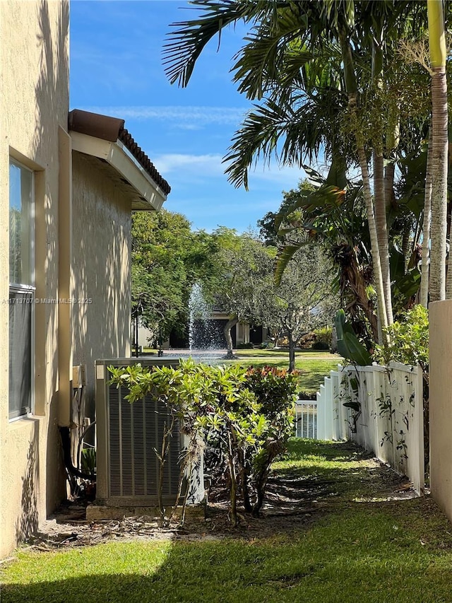 view of yard featuring central AC