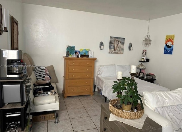 bedroom with light tile patterned floors