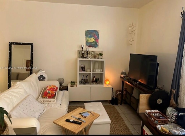 living room with tile patterned flooring