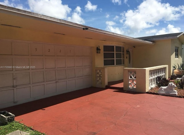 exterior space featuring stucco siding