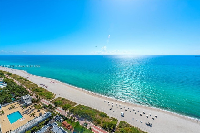 drone / aerial view with a view of the beach and a water view