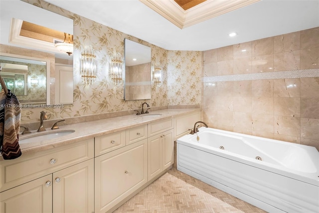 bathroom with parquet flooring, a tub to relax in, crown molding, a tray ceiling, and vanity