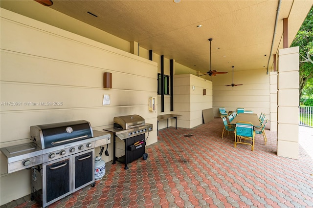 view of patio / terrace with a grill and ceiling fan