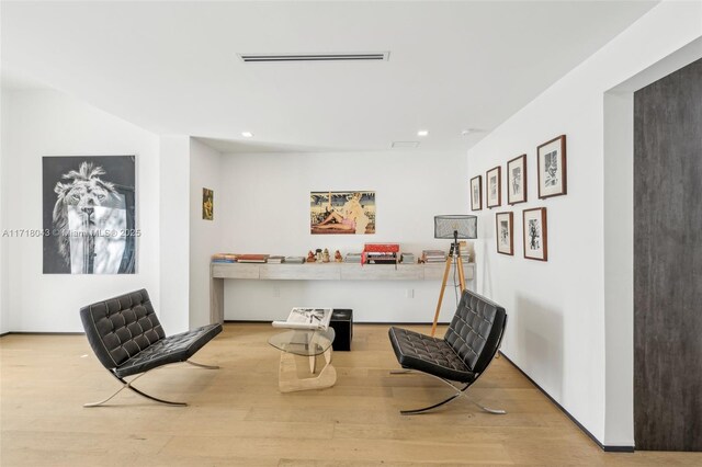 bedroom with light hardwood / wood-style flooring