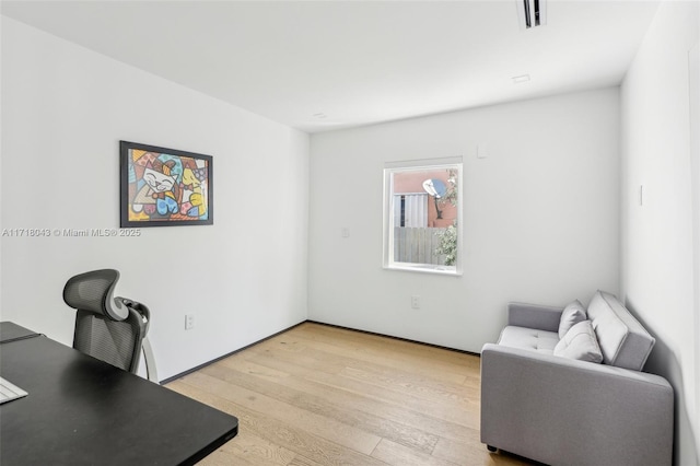 home office featuring light wood-type flooring