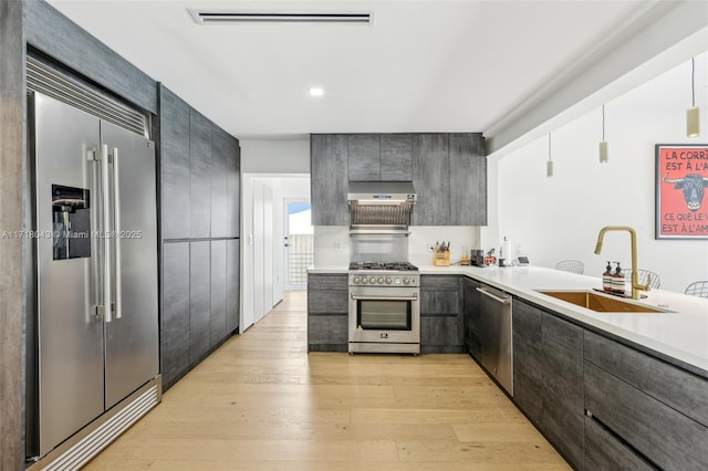 dining room with light wood-type flooring and sink