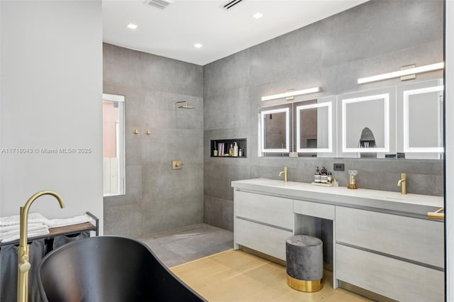 bathroom featuring a tub and hardwood / wood-style flooring