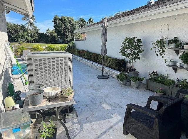 view of patio / terrace featuring central AC unit