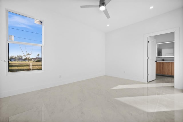 unfurnished room with ceiling fan