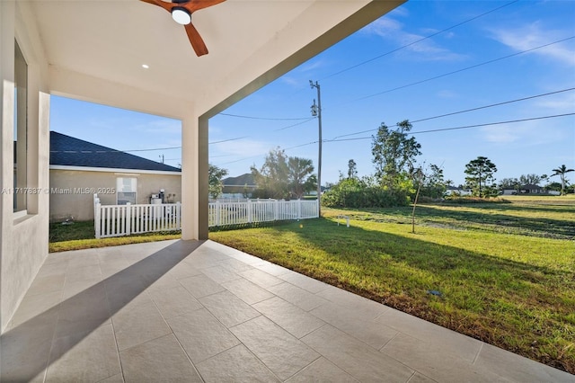 view of patio / terrace featuring ceiling fan