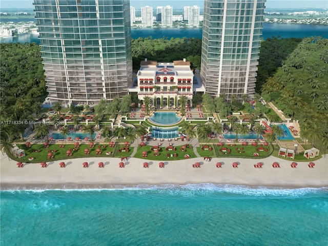 aerial view featuring a water view and a view of the beach