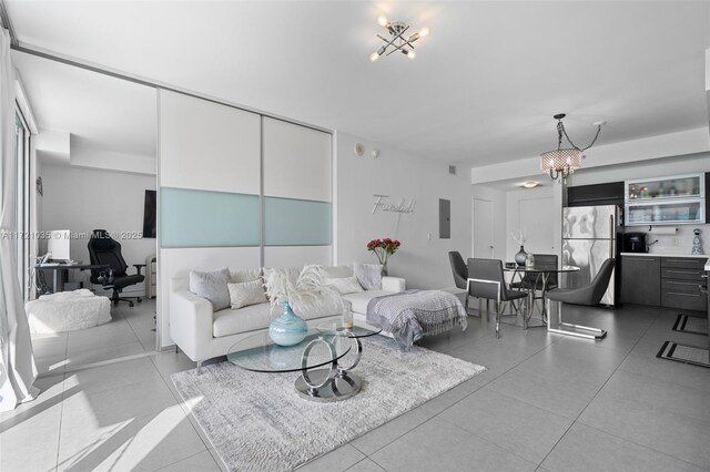 90 SW 3rd St Unit 2603, Miami, FL 33130 - spare room with a skyline view, tile patterned floors, and baseboards
