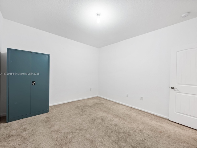 empty room with carpet floors