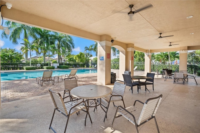 view of patio featuring a community pool