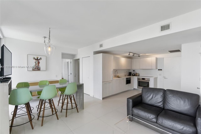 tiled living room with sink