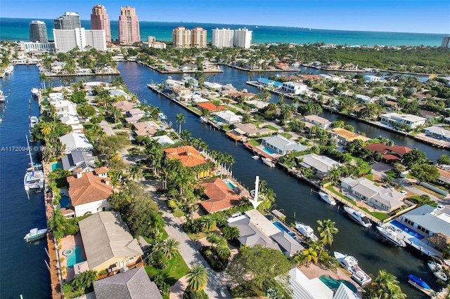 birds eye view of property featuring a water view