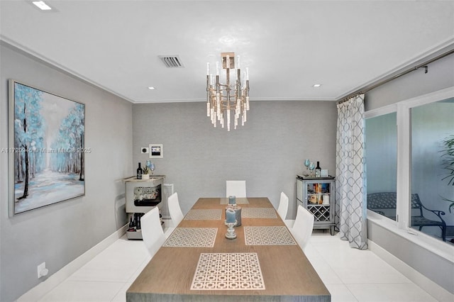 tiled dining space with ornamental molding and a notable chandelier