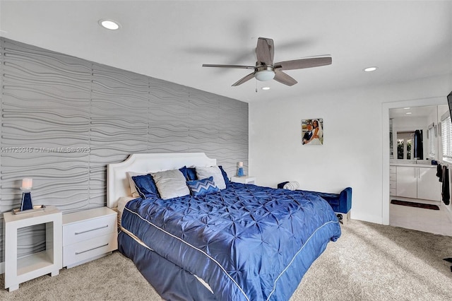 carpeted bedroom featuring ceiling fan