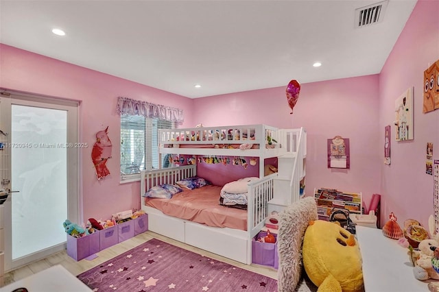 bedroom with light hardwood / wood-style flooring