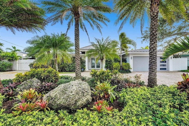 view of front of property with a garage