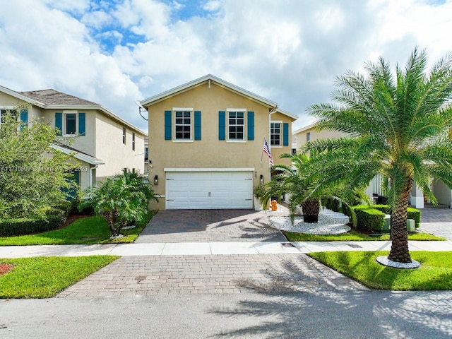 view of front of home with a garage