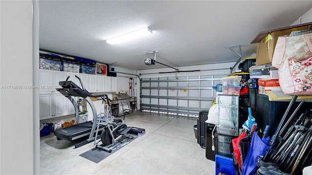 garage featuring a garage door opener