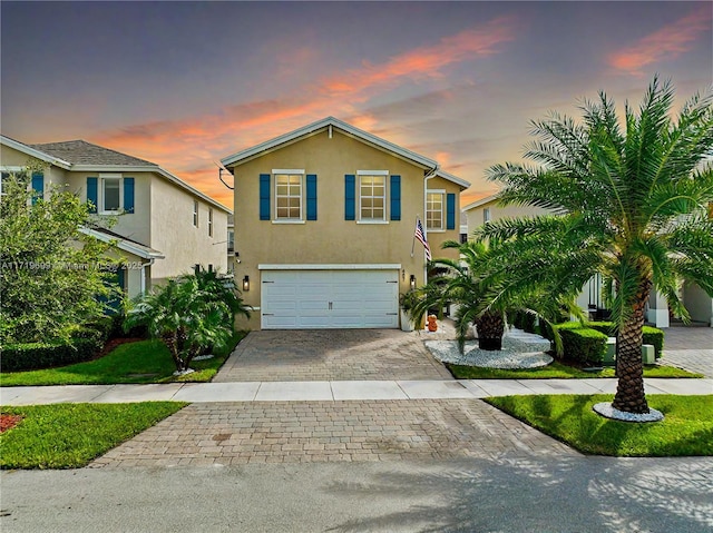 view of front of property featuring a garage