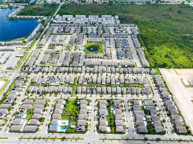 drone / aerial view featuring a water view