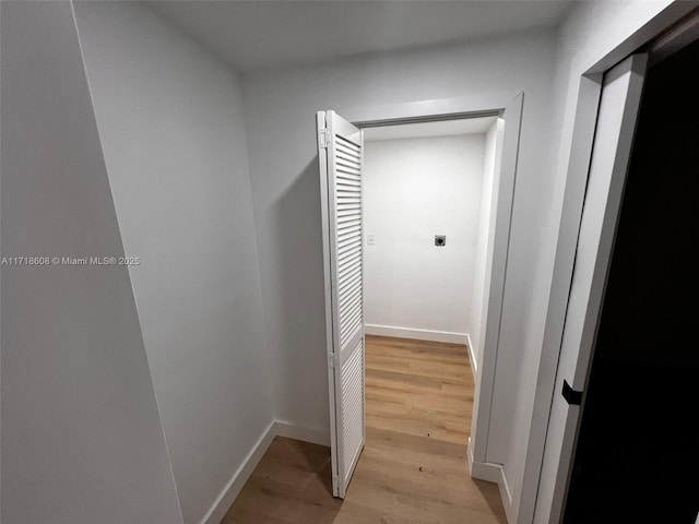 corridor featuring light hardwood / wood-style floors