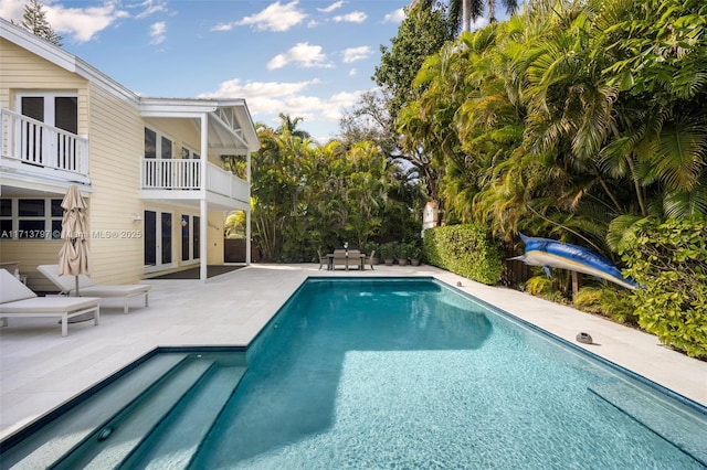 view of pool with a patio area