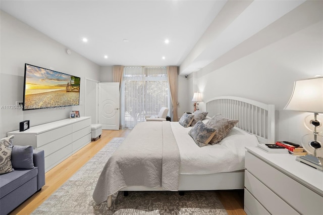 bedroom with light wood-type flooring