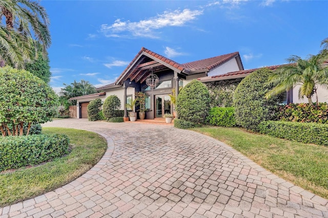 view of front of home featuring a garage