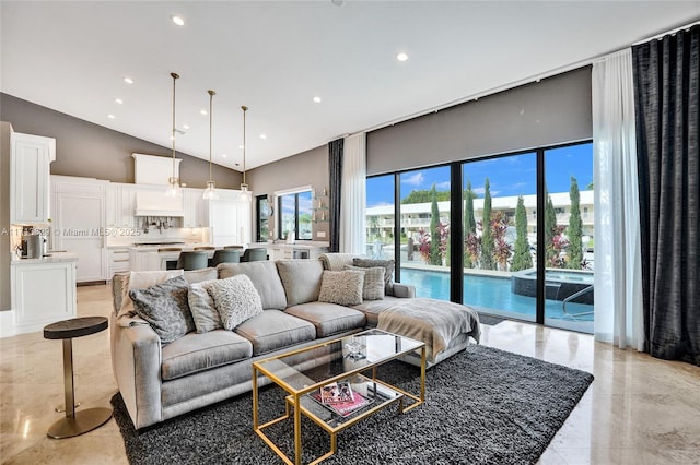 living room with a towering ceiling