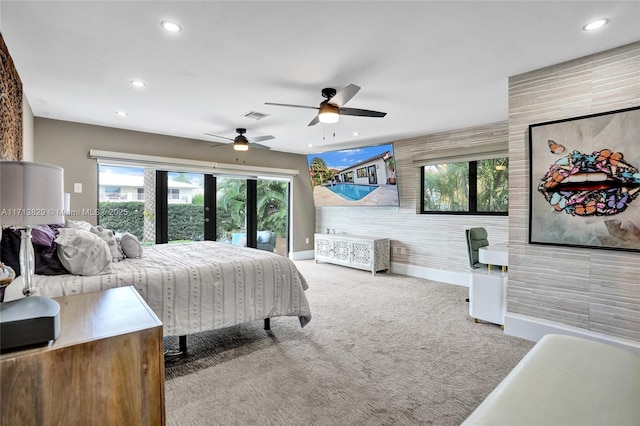 bedroom with ceiling fan, french doors, and light colored carpet