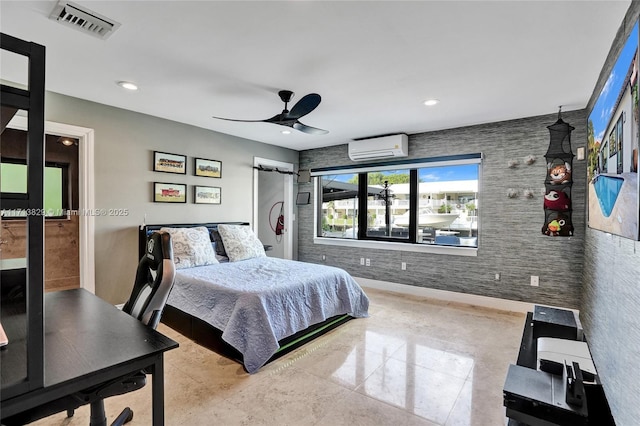 bedroom featuring an AC wall unit and ceiling fan