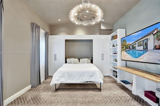 carpeted bedroom featuring a notable chandelier and high vaulted ceiling