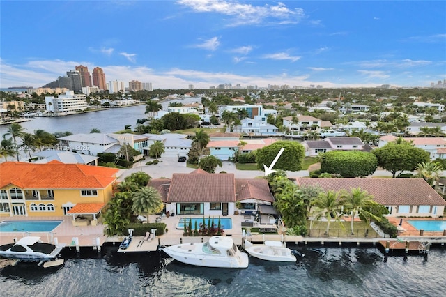 drone / aerial view with a water view