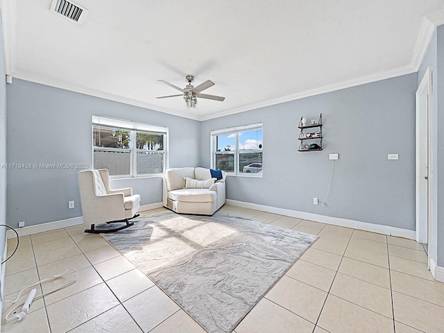 sitting room featuring crown molding, ceiling fan, and light tile patterned floors