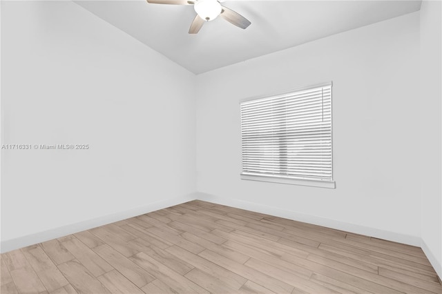 spare room with light hardwood / wood-style floors, plenty of natural light, and ceiling fan