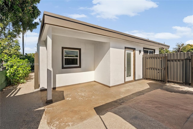 back of house featuring a patio area